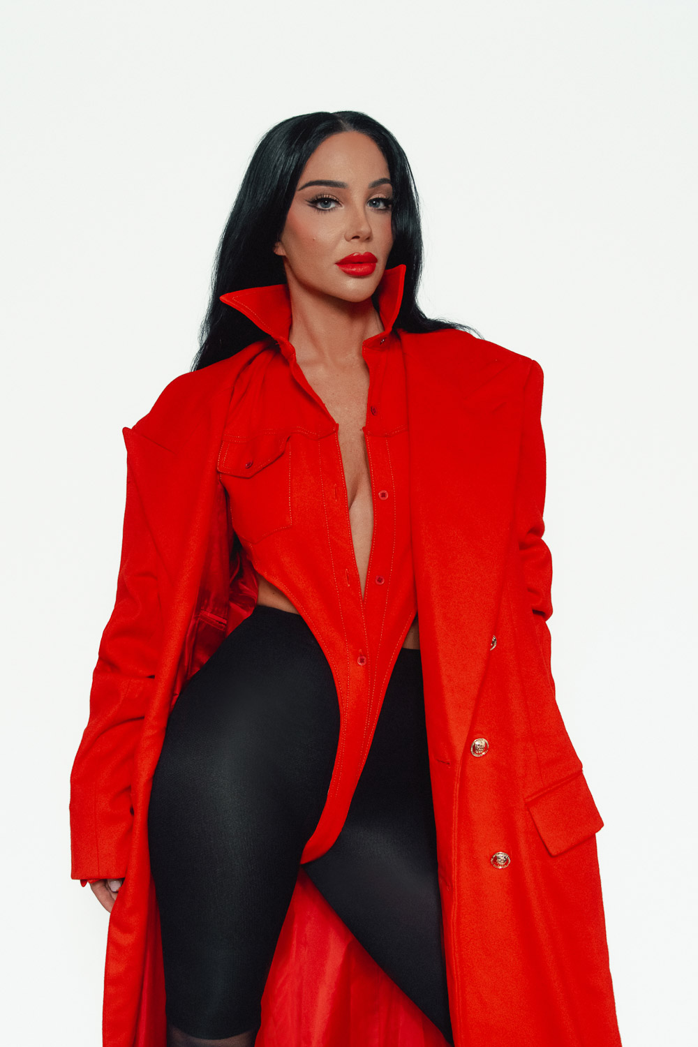 Tulisa Contostavlos in a red outfit for FAULT Magazine covershoot