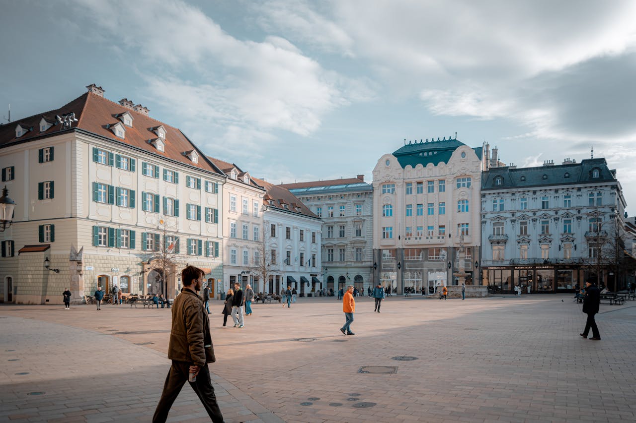 People walking around in Bratislava’s main square